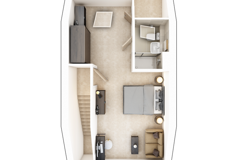 A studio apartment with a bed, seating area, and bathroom.