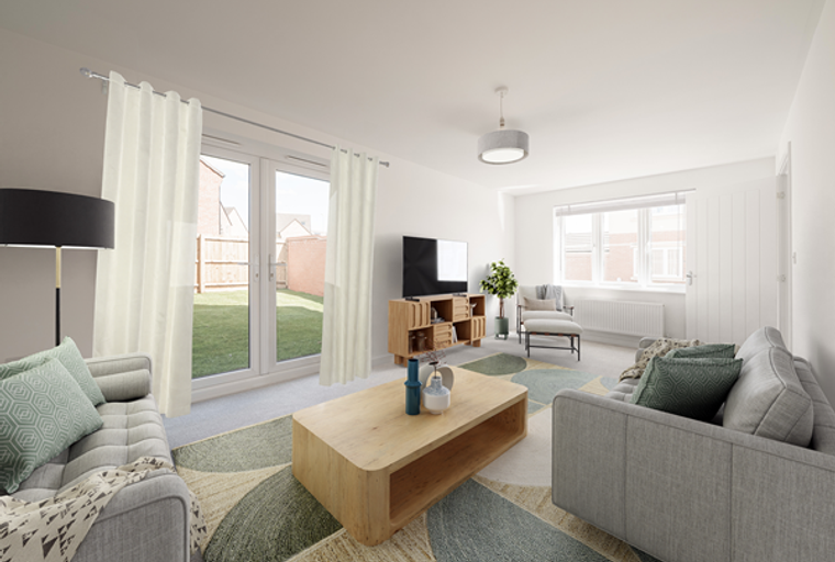 A living room with a sofa, coffee table, and French doors leading to a garden.