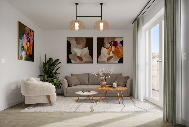 A living room with a sofa, armchair, coffee tables, and artwork.