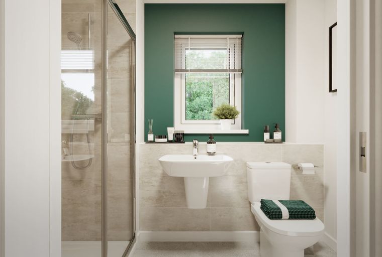 A bathroom with a shower, sink, and toilet.