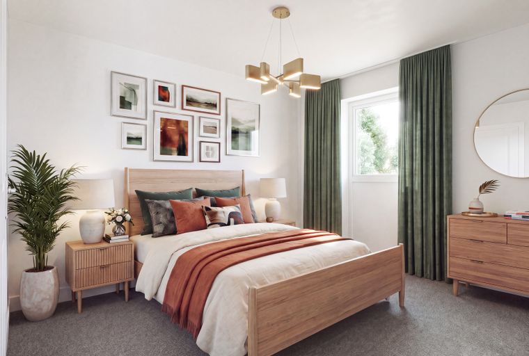 A bedroom with a bed, nightstands, and artwork on the wall.