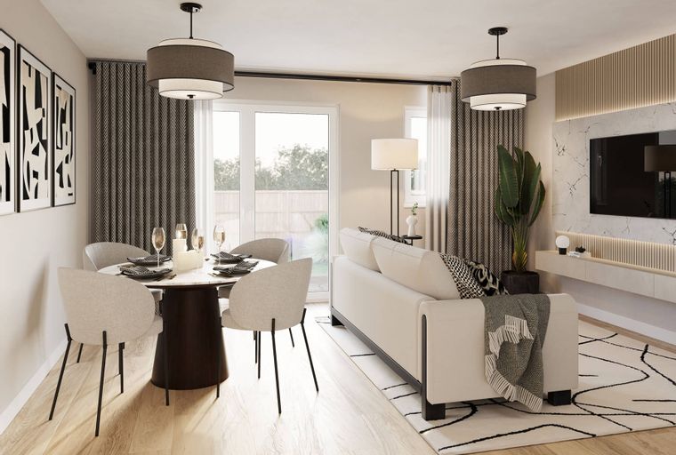 A dining area and living room with a round table, chairs, a sofa, and a TV.