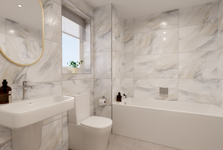 A bathroom with a sink, toilet, and bathtub.