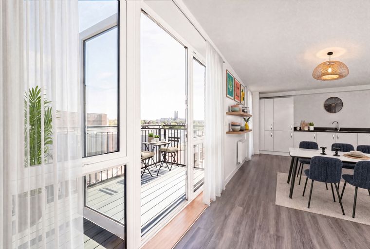 A modern apartment living room and kitchen area with a balcony visible through large glass doors.