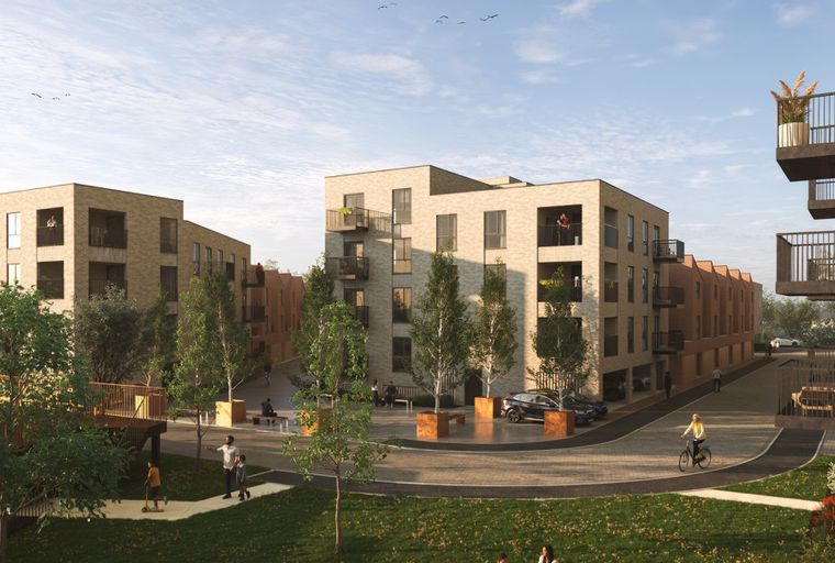 A street view of a modern apartment complex with balconies and trees.