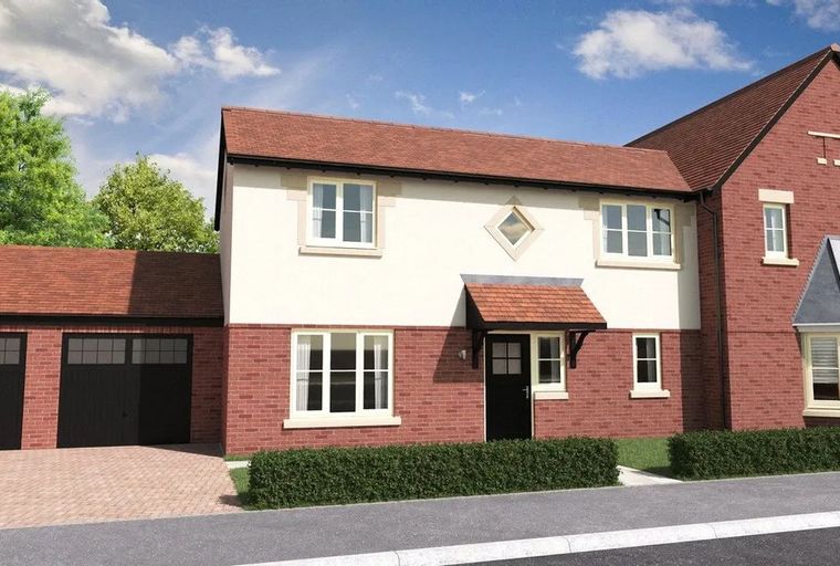 A modern house with red brick and cream render, featuring multiple windows, a front door with a canopy, and a double garage.