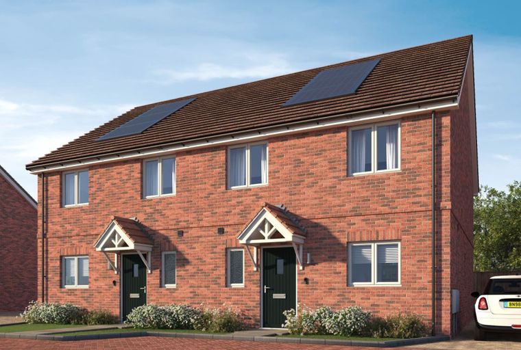 A pair of red brick semi-detached houses with solar panels on the roof and a white car parked in the driveway.