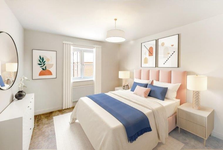 A bedroom with a bed, headboard, bedside tables, and artwork.