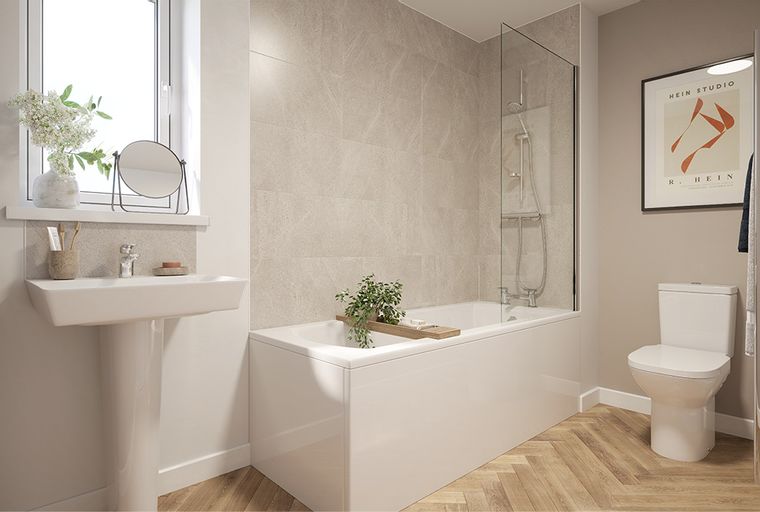 A bathroom with a bathtub, a sink, and a toilet.