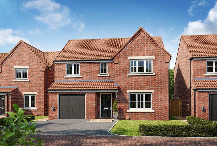 A red brick house with a driveway and a garage.