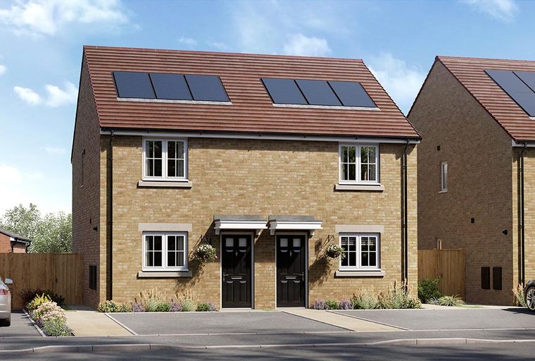 A pair of semi-detached brick houses with solar panels on the roof.