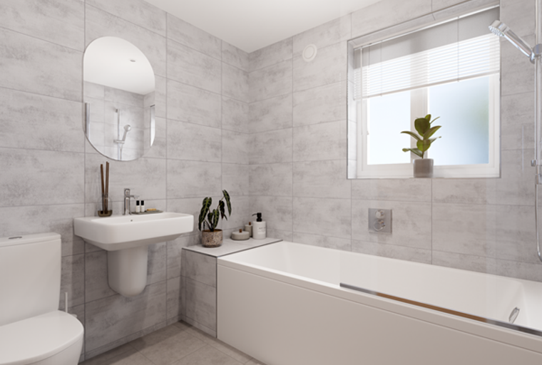 A bathroom with a bathtub, sink, toilet, and a window.