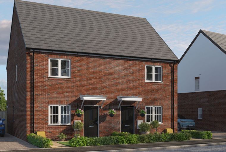 A pair of red brick semi-detached houses with grey tiled roofs and white-framed windows.