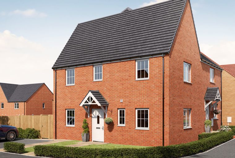 A row of brick houses with pitched roofs and windows.