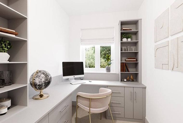 A home office with a desk, computer, chair, and bookshelves.