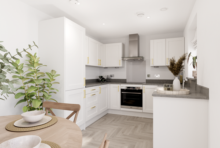 A modern white kitchen with a dining table and chairs.