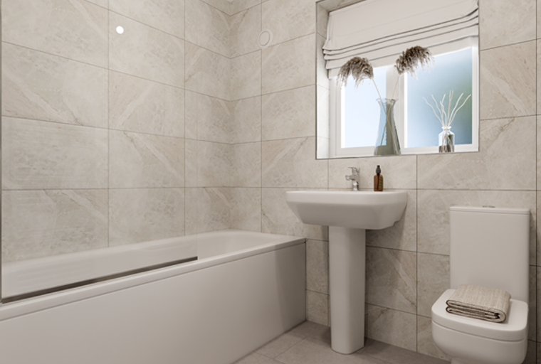 A bathroom with a bathtub, sink, and toilet.