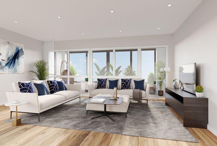 A living room with a sectional sofa, coffee table, and a television.