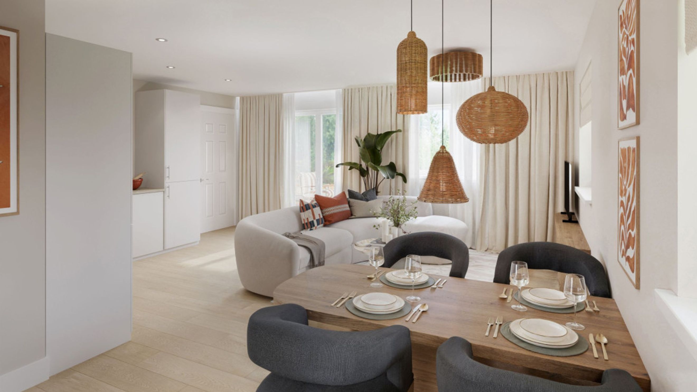 A dining area and living room with a sectional sofa, dining table, and pendant lights.