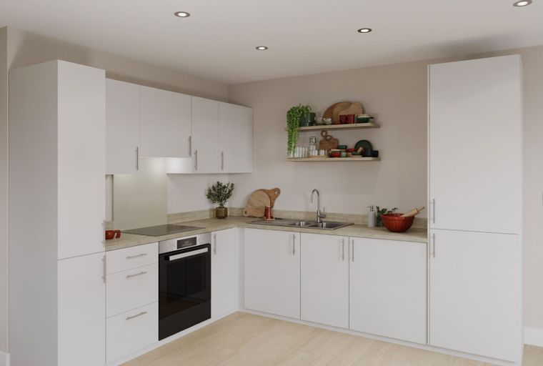 A modern L-shaped kitchen with white cabinets, a built-in oven, and a double sink.