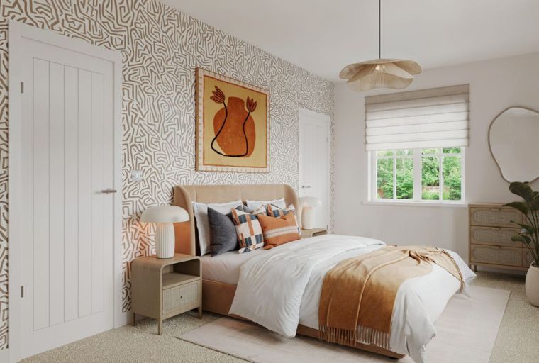 A bedroom with a bed, bedside tables, a dresser, and a window.