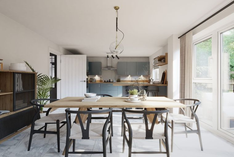 A dining area and kitchen with a wooden table, chairs, and blue cabinets.