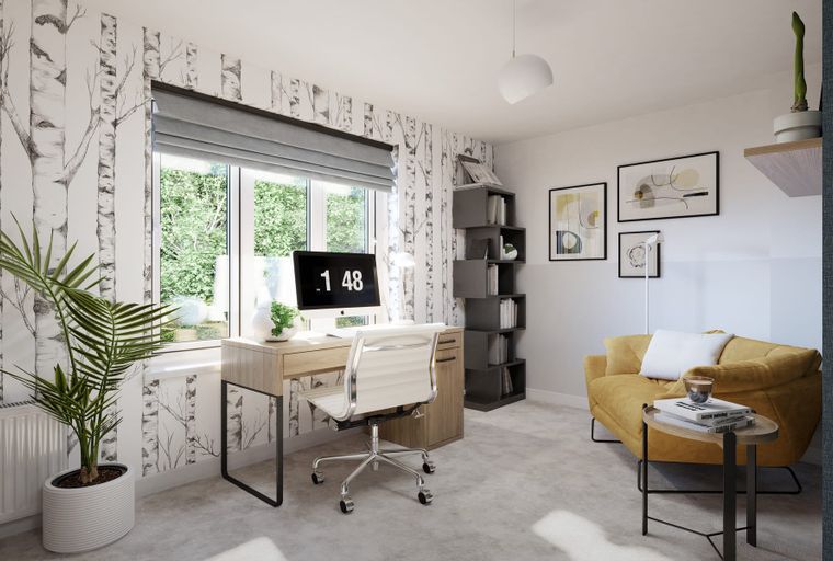 A home office with a desk, chair, computer, and armchair.