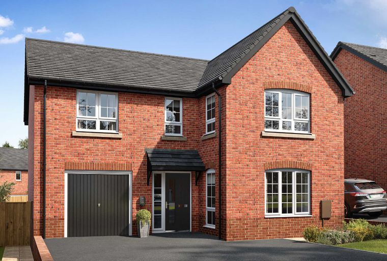 A red brick house with a dark garage door and a black front door.