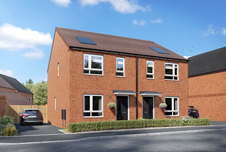 A pair of modern red brick semi-detached houses with dark roofs and driveways.