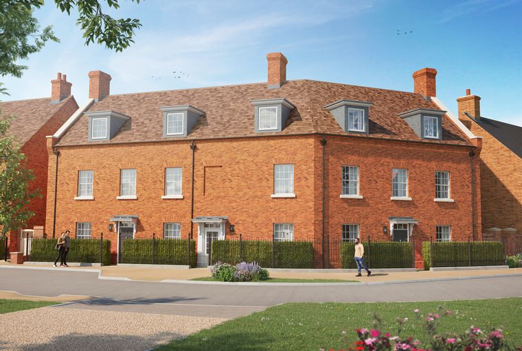 A row of red brick townhouses with dormer windows and chimneys.