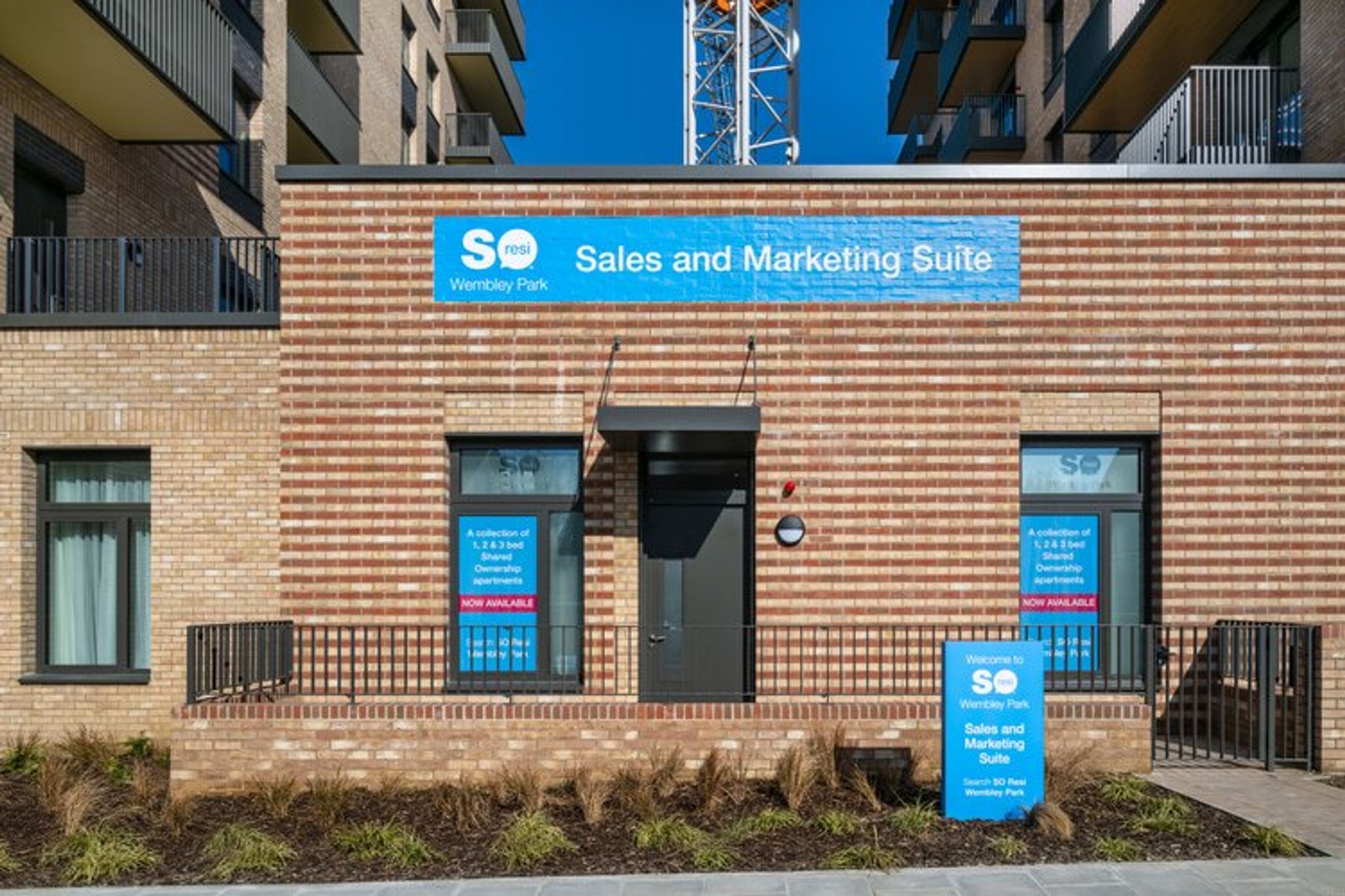 A sales and marketing suite for Wembley Park with a sign indicating shared ownership apartments.
