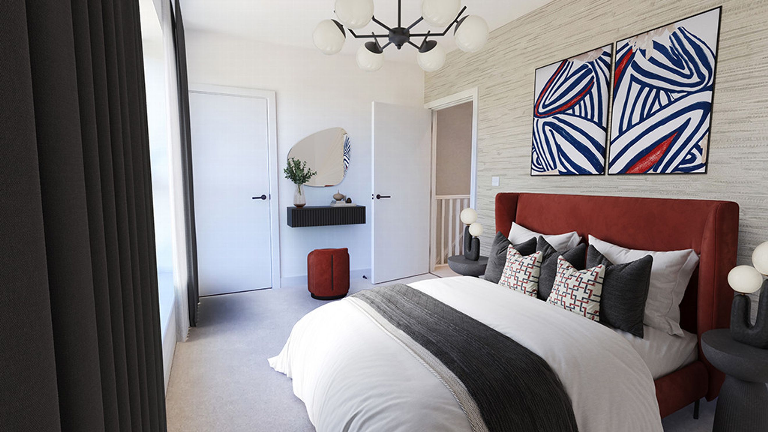 A bedroom with a bed, abstract art, and a vanity.