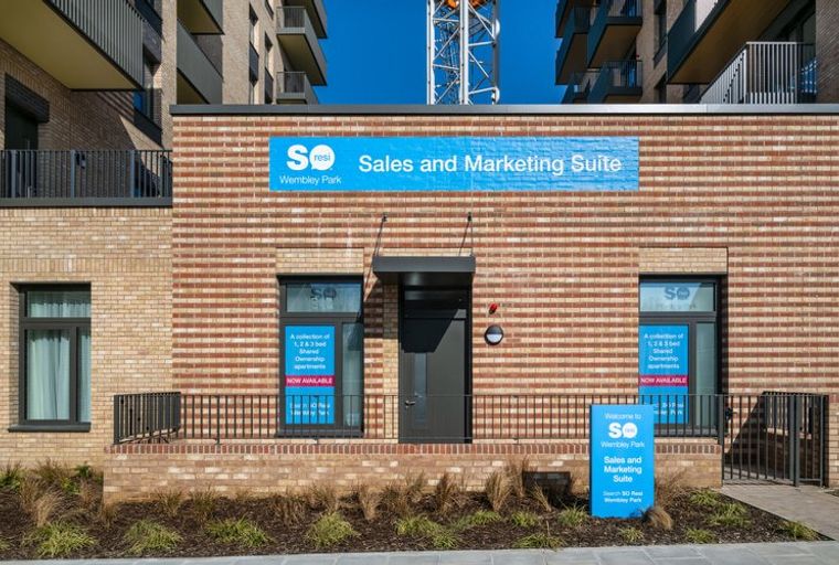 A sales and marketing suite for Wembley Park with a sign indicating shared ownership apartments.