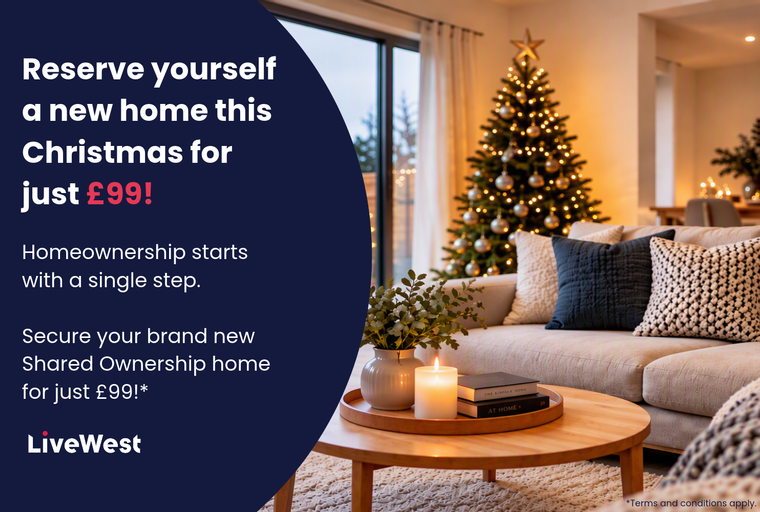 A living room decorated for Christmas with a sofa, coffee table, and a Christmas tree.