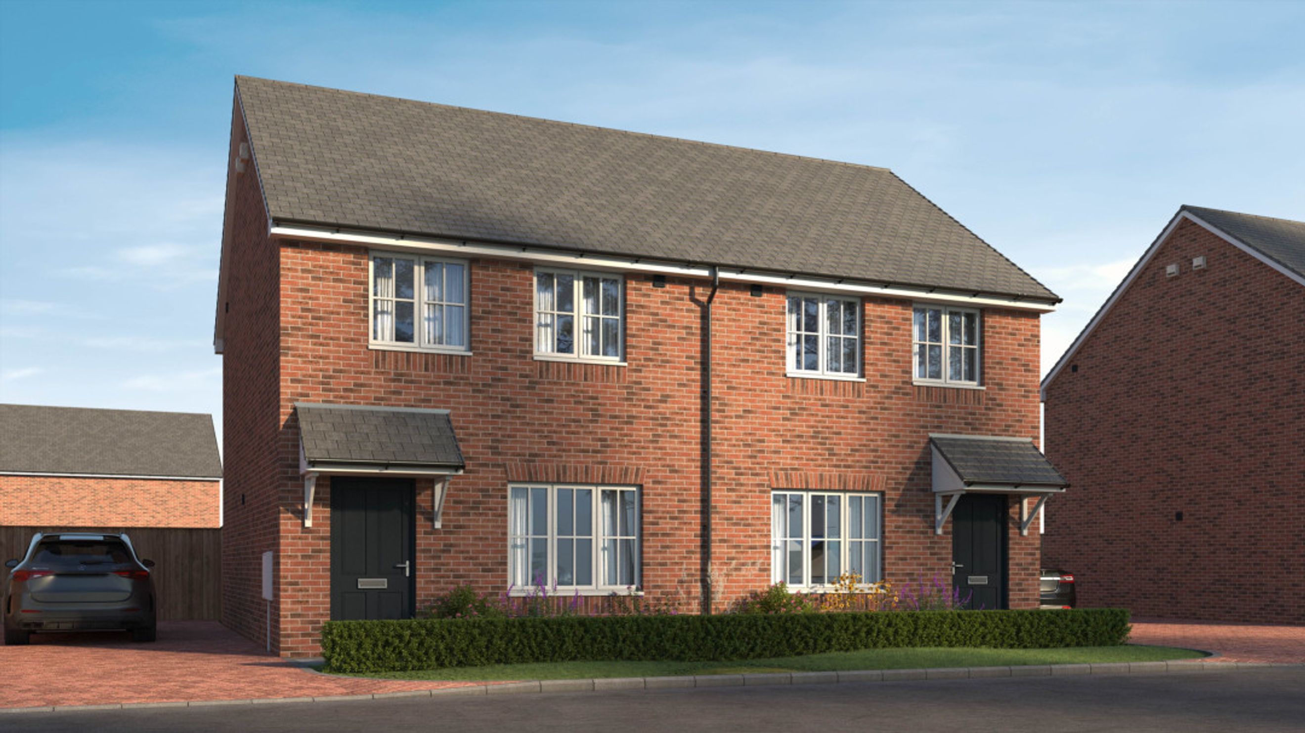 A pair of semi-detached brick houses with dark grey doors and white-framed windows.