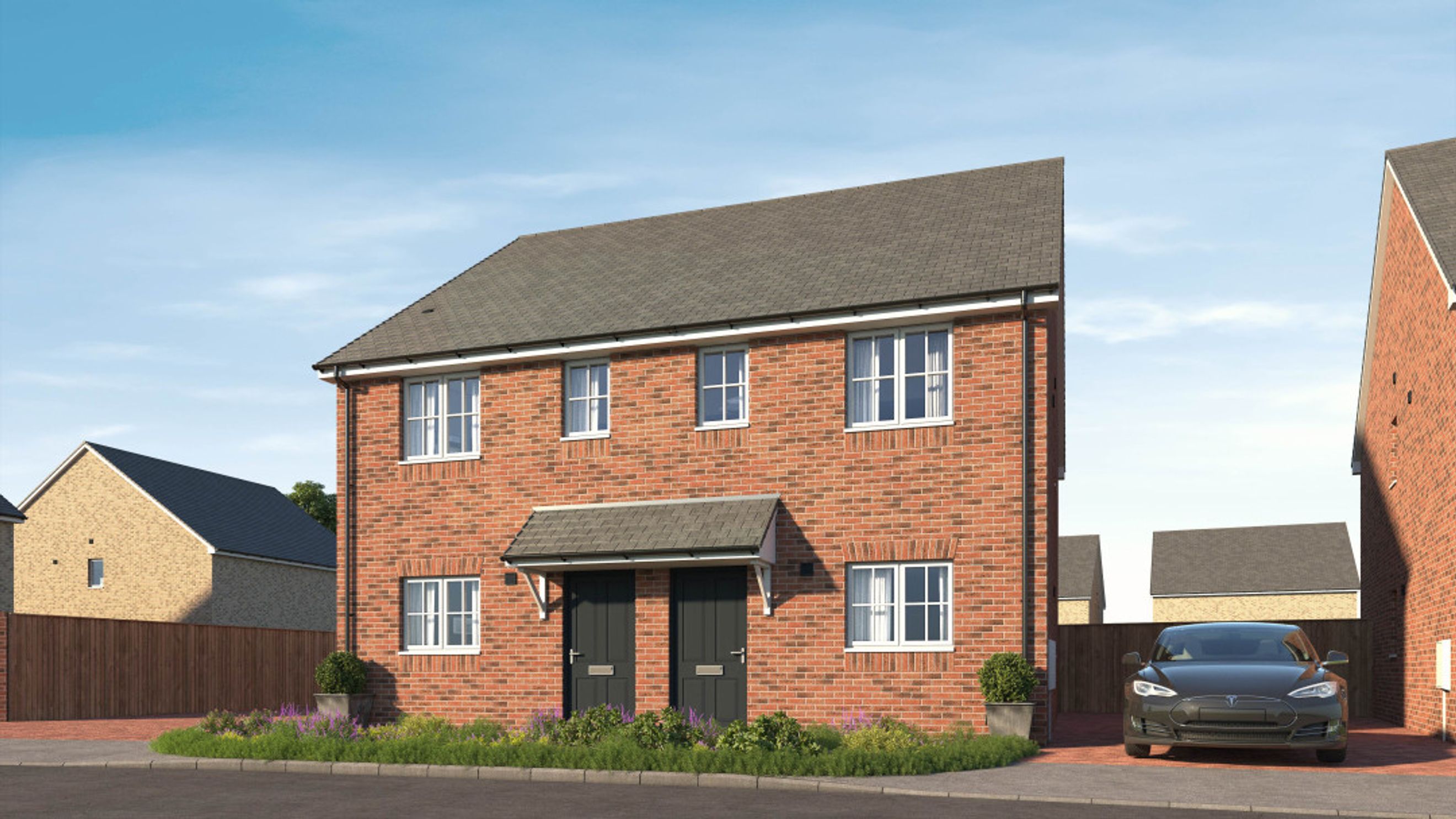 A red brick semi-detached house with two front doors, white-framed windows, and a grey roof, parked in front of a driveway with a black car.