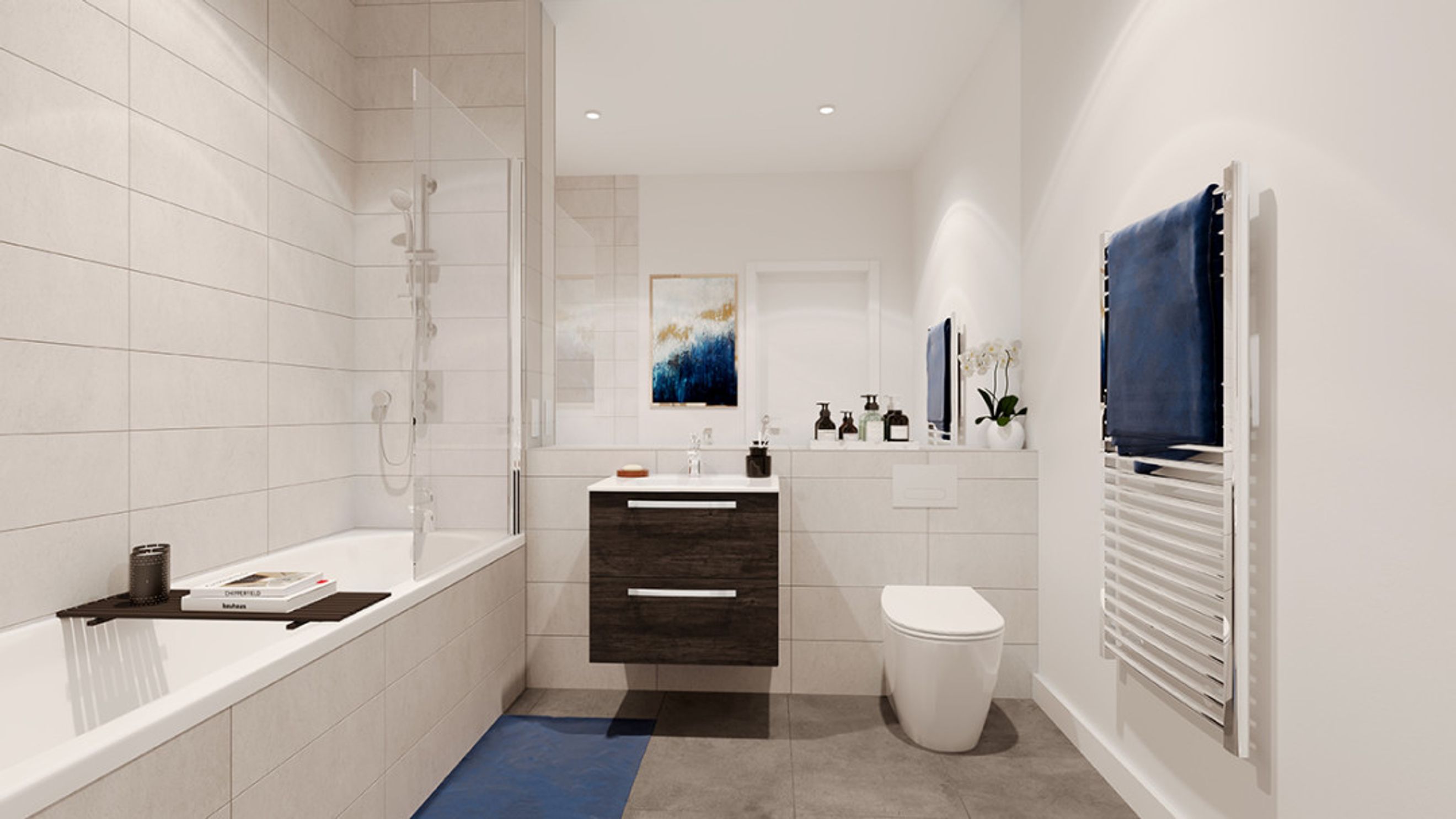 A bathroom with a bathtub, toilet, and vanity.