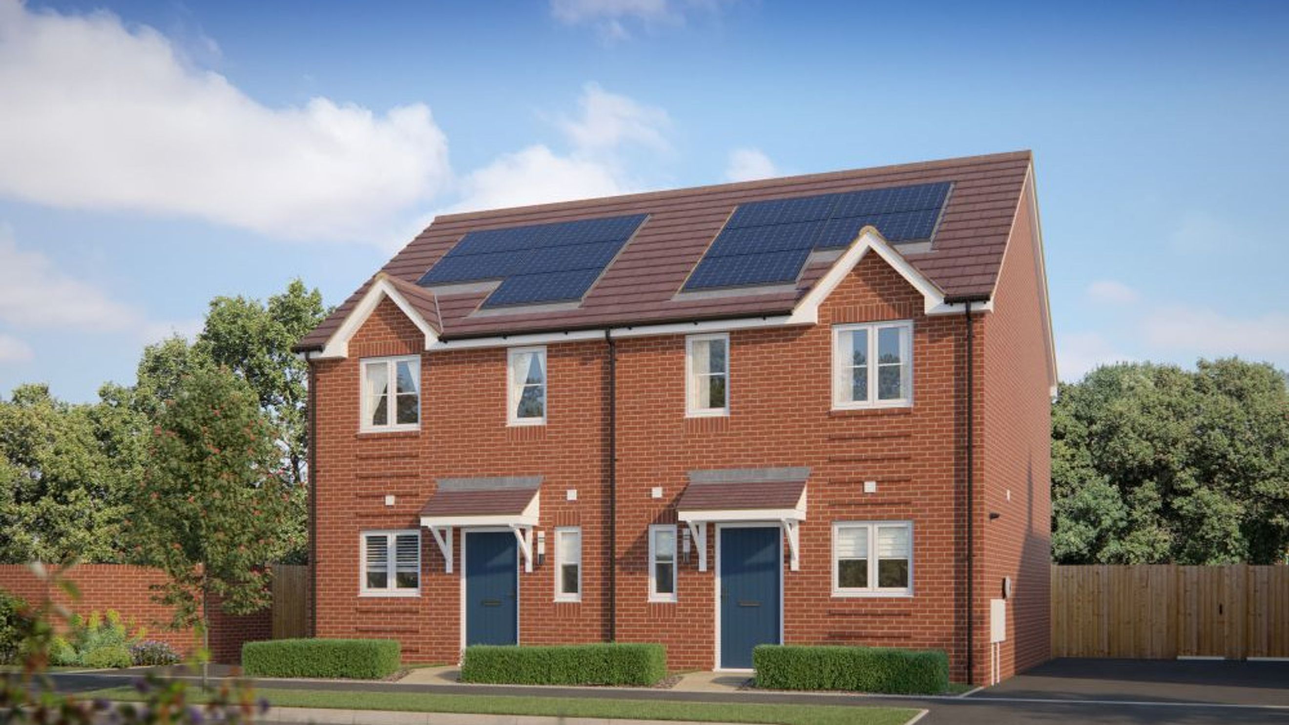 A pair of modern brick semi-detached houses with blue doors and solar panels on the roof.