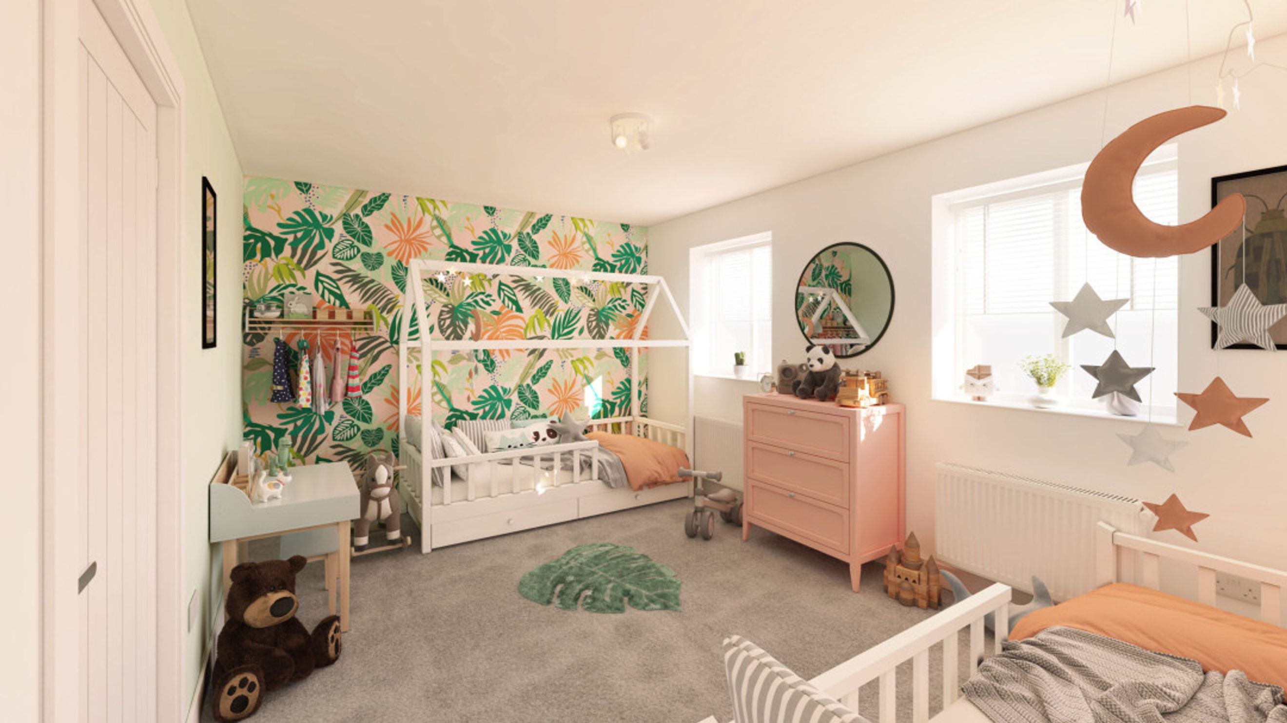 A children's bedroom with two beds, a pink dresser, and jungle-themed wallpaper.