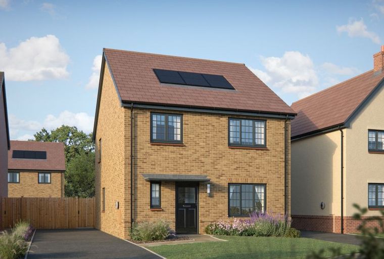 A modern brick house with solar panels on the roof, surrounded by a lawn and driveway.