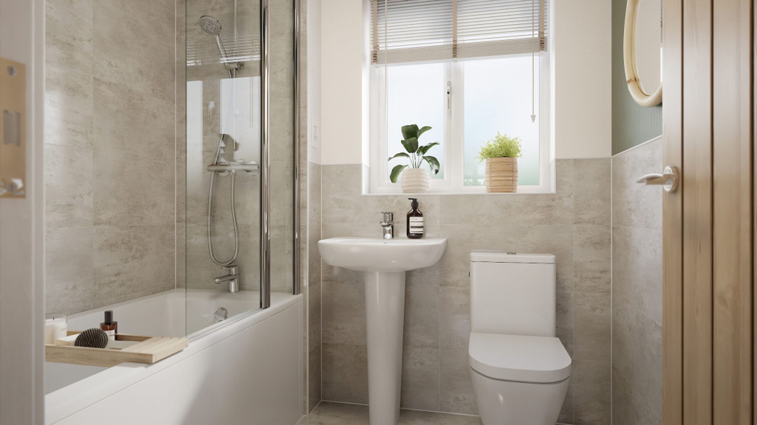 A bathroom with a bathtub, shower, sink, and toilet.