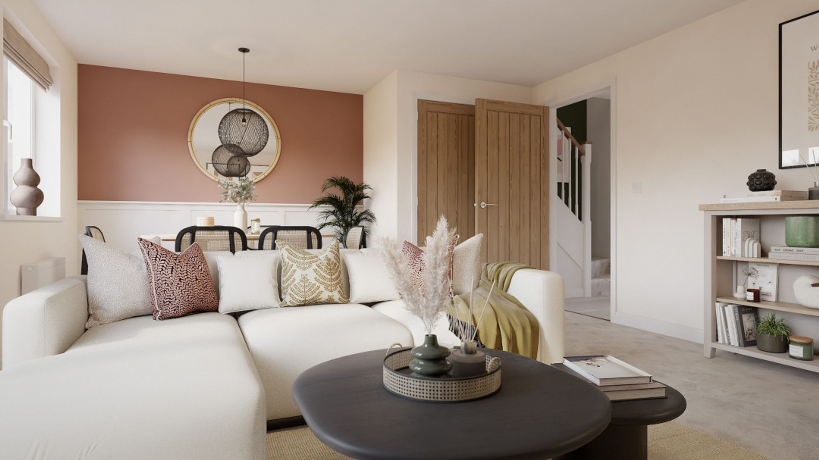 A living room with a sectional sofa, coffee table, and dining area.
