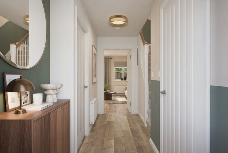 A hallway with a console table, mirror, and doors leading to other rooms.